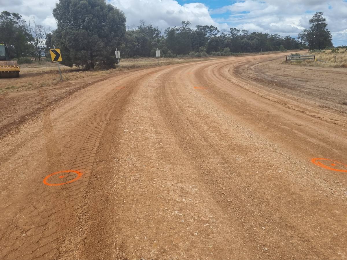 Freshly formed unsealed road on a curve